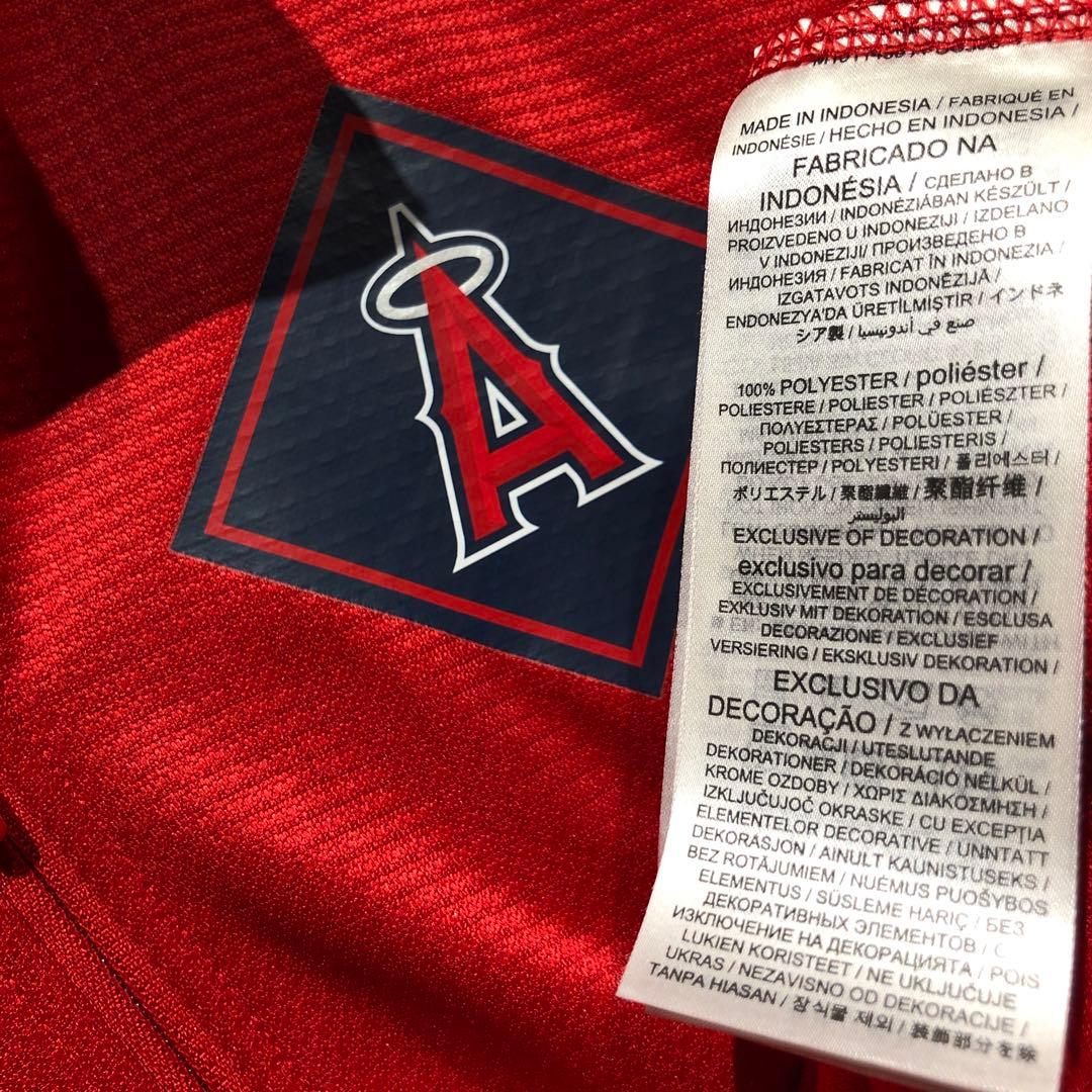 入手困難NIKE MLB エンゼルス ダイアモンドアイコンクォータージップトップ