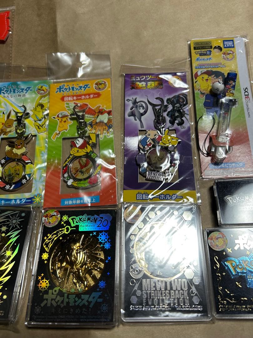 ポケモン 映画限定 グッズ 20周年記念劇場メダル ピンズ キーホルダー