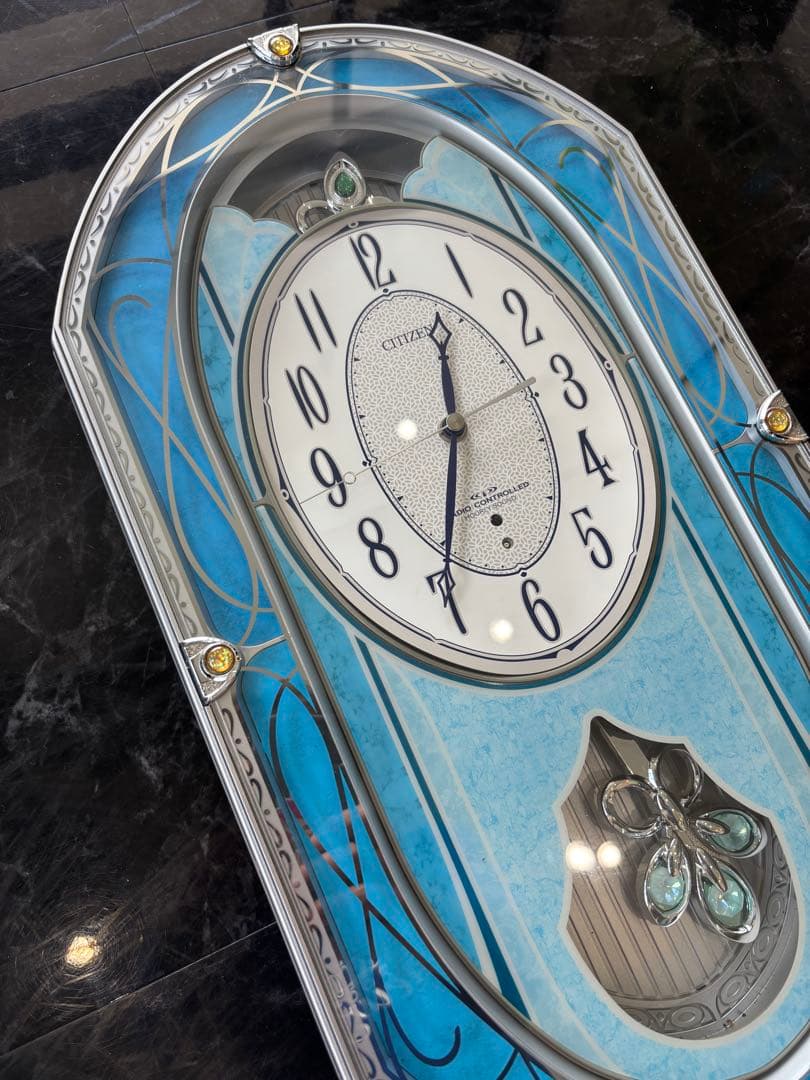 CITIZEN 電波時計 青いオーバル型