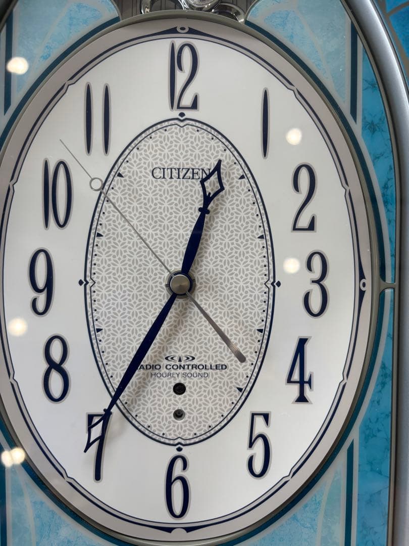 CITIZEN 電波時計 青いオーバル型