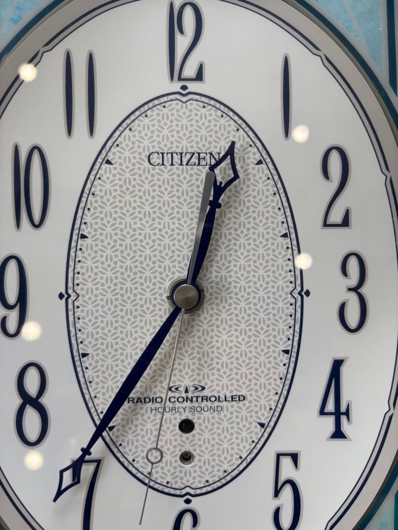 CITIZEN 電波時計 青いオーバル型
