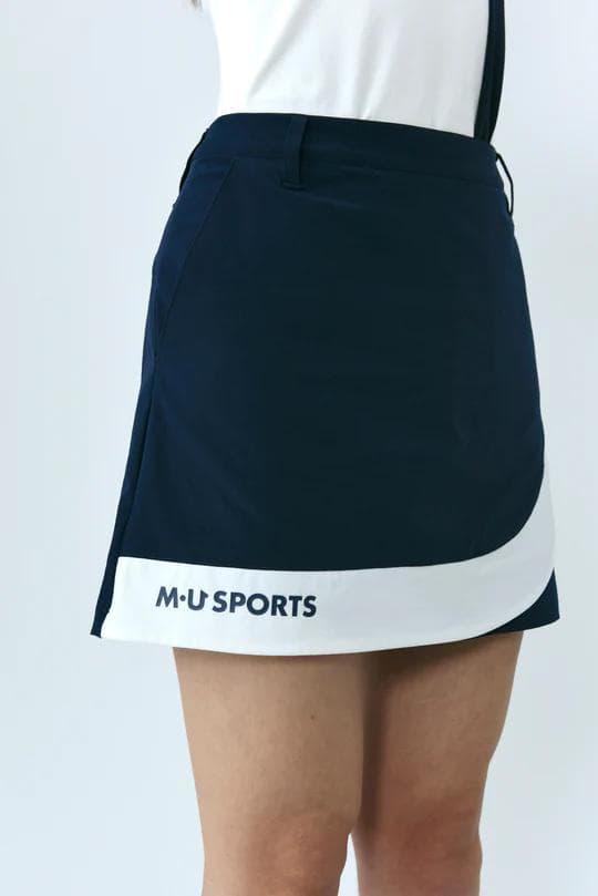 エムユースポーツ(M・U SPORTS) バイカラーラップ風スカート NVY40