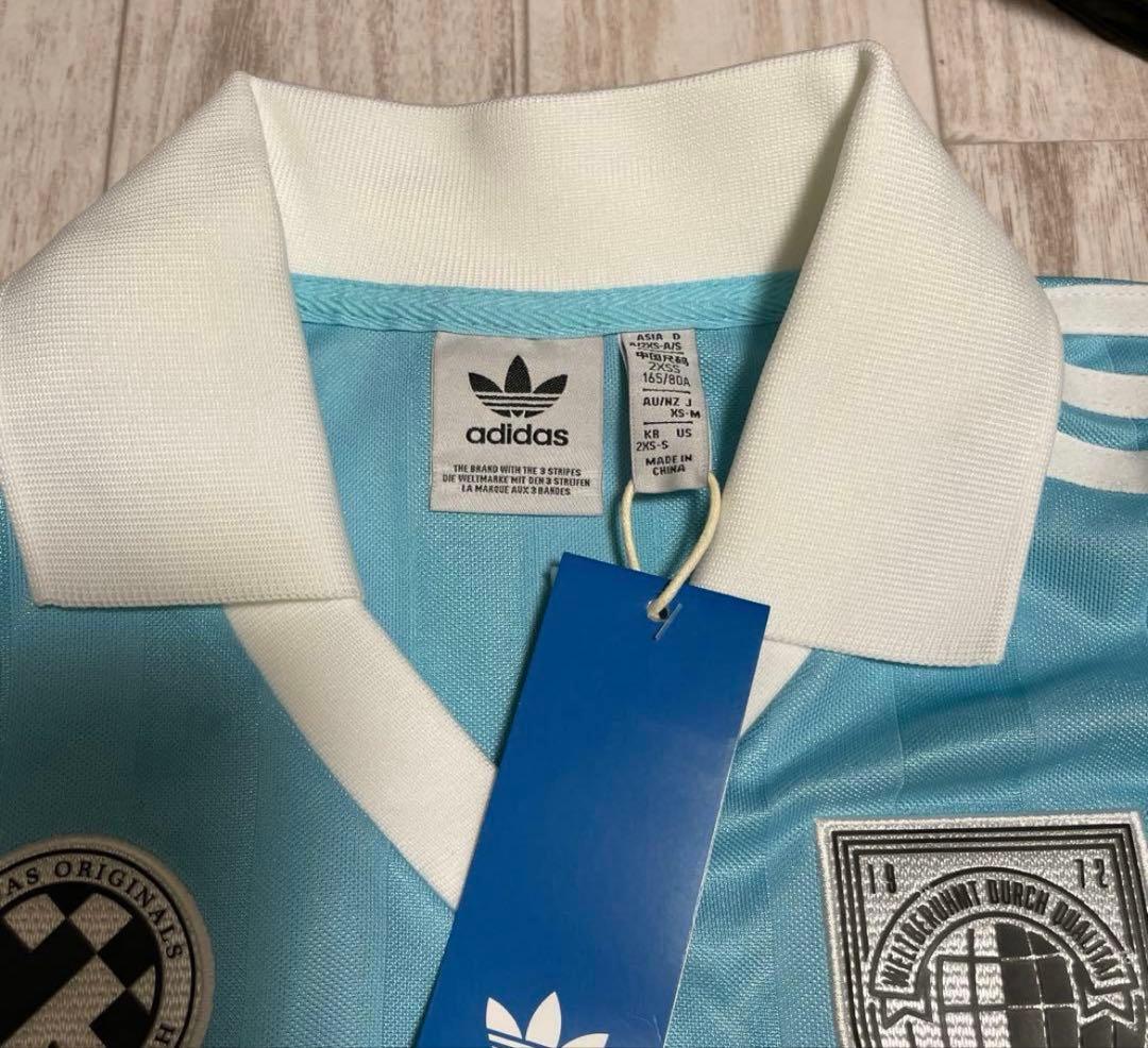 adidas 水色 長袖シャツ エンブレム付き