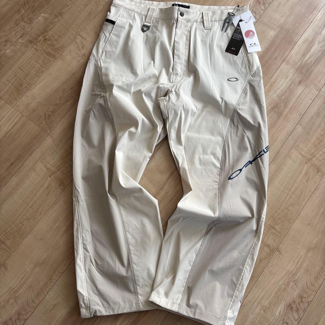 新品　オークリー　メンズ　ゴルフ　ストレッチ　ゆったり　通年用　撥水　防風　36