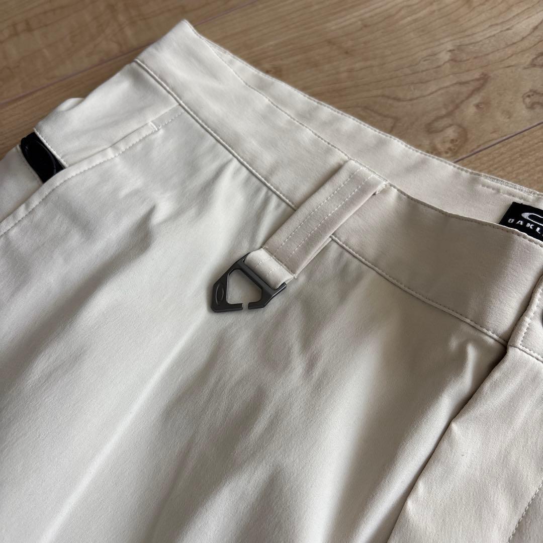 新品　オークリー　メンズ　ゴルフ　ストレッチ　ゆったり　通年用　撥水　防風　36
