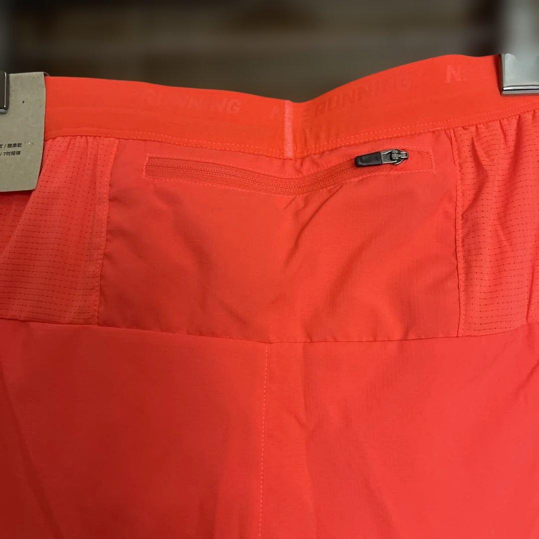 新品タグ付き　Nike ランニングショーツ オレンジ　 Mサイズ