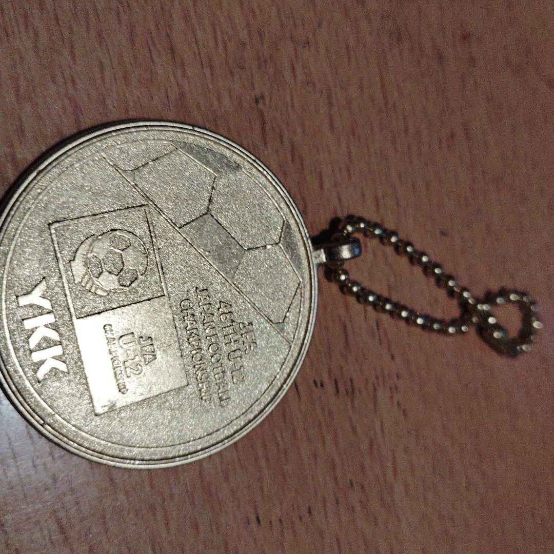 金かな？