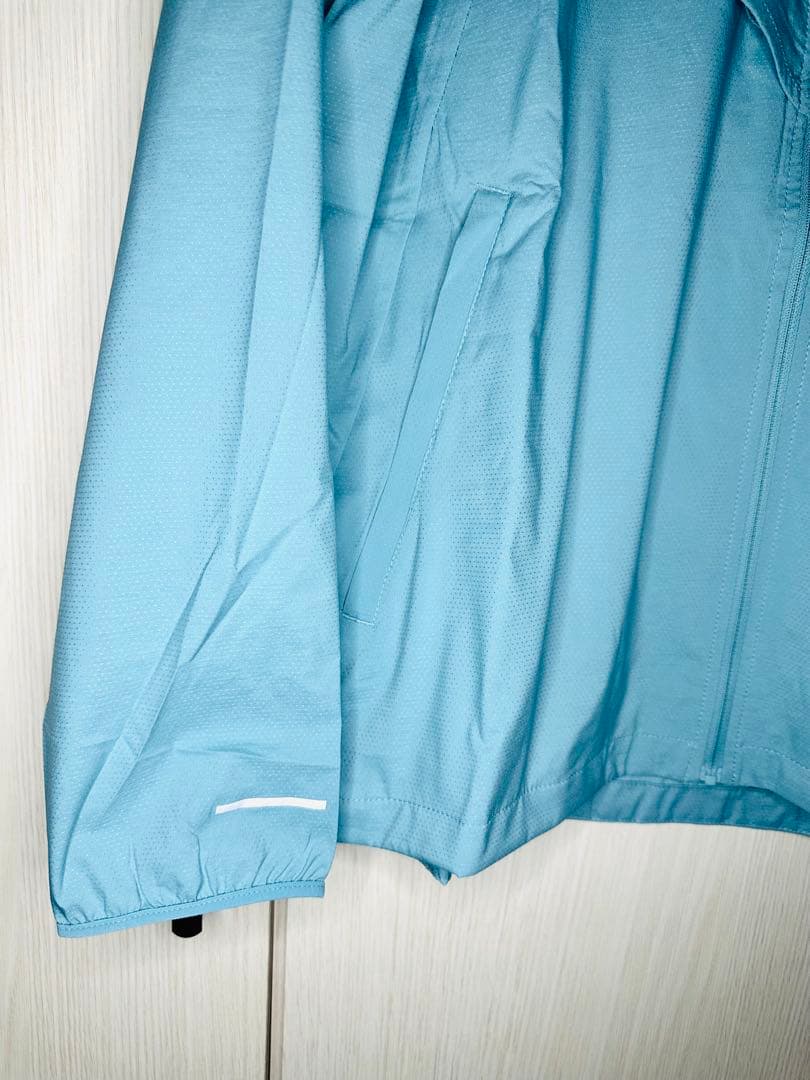 新品2XLサイズ　Nike ライトブルー ウィンドブレーカー