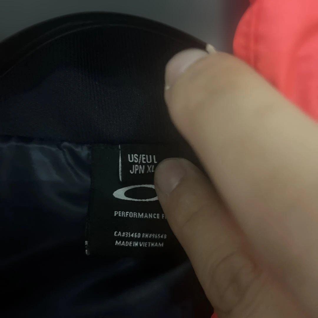Oakley ベスト JPN XL