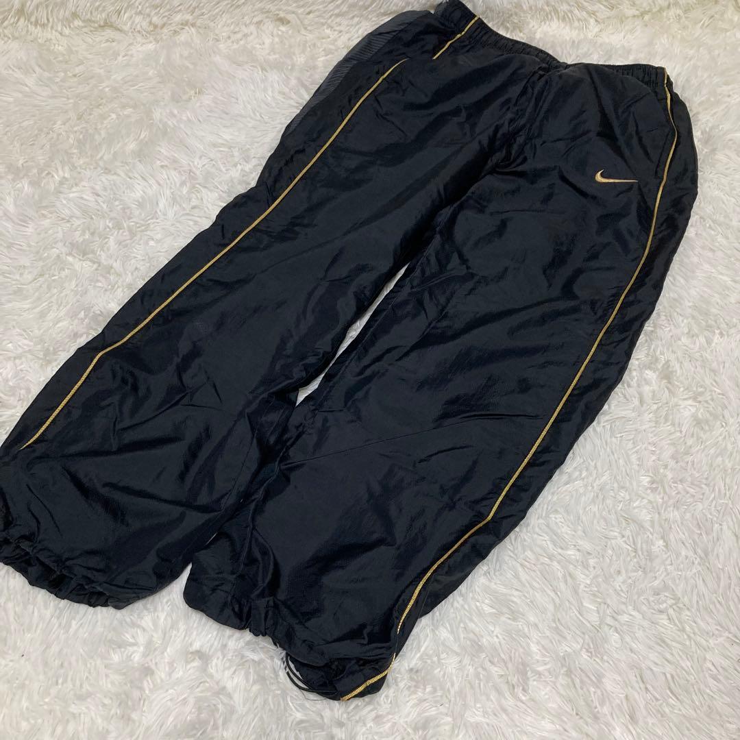 Nike ブラック ゴールド　ナイロンジャージ上下セット M.L