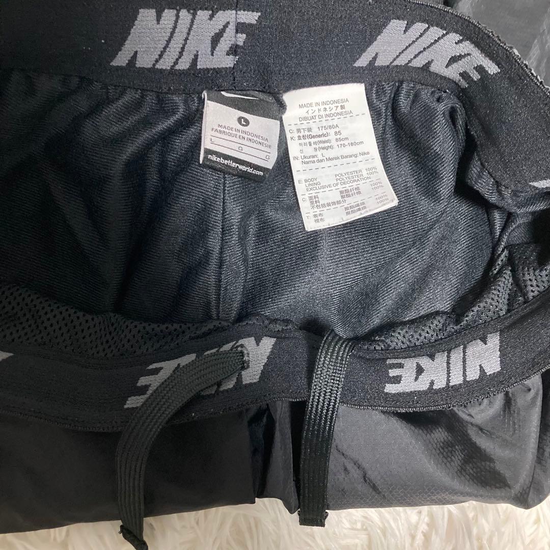 Nike ブラック ゴールド　ナイロンジャージ上下セット M.L
