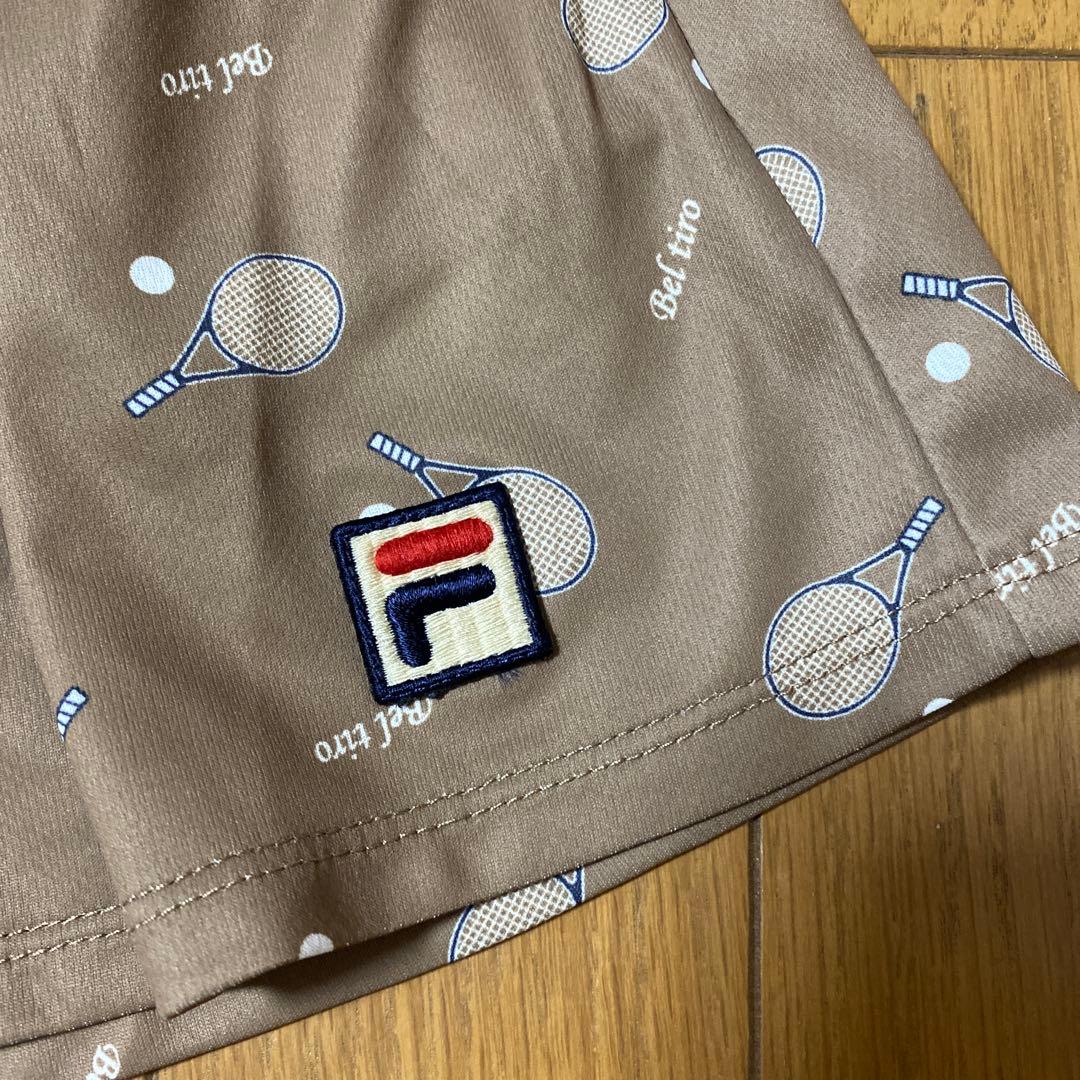 ①FILA フィラ　テニスキュロット　ラケット柄