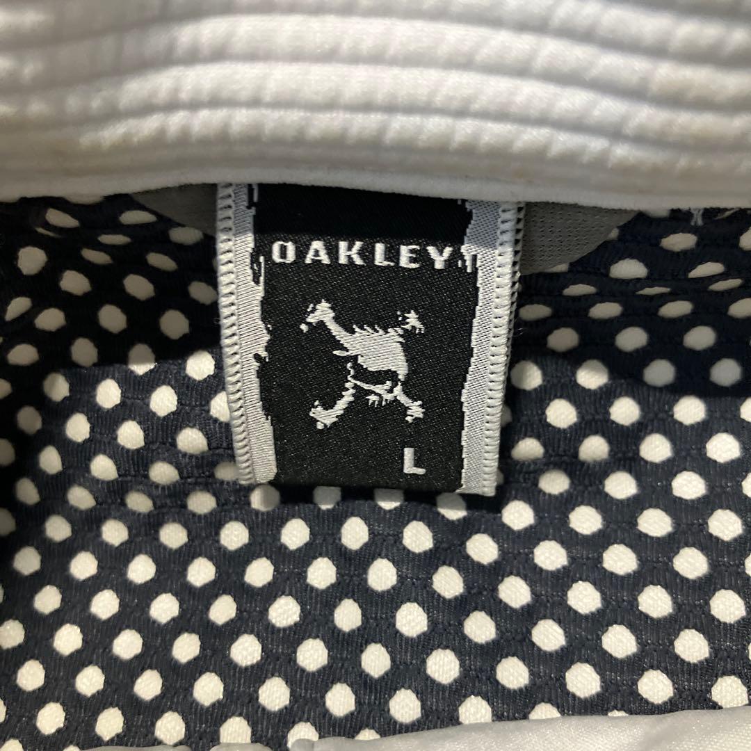 OAKLEY ジャケット 白 ゴルフウェア