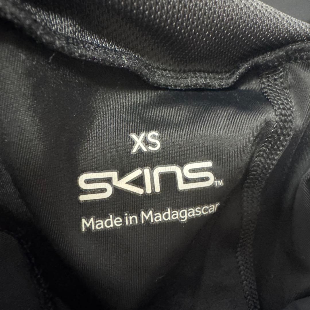 SKINS ブラック レディース トラベル ＆ リカバリー ロングタイツ
