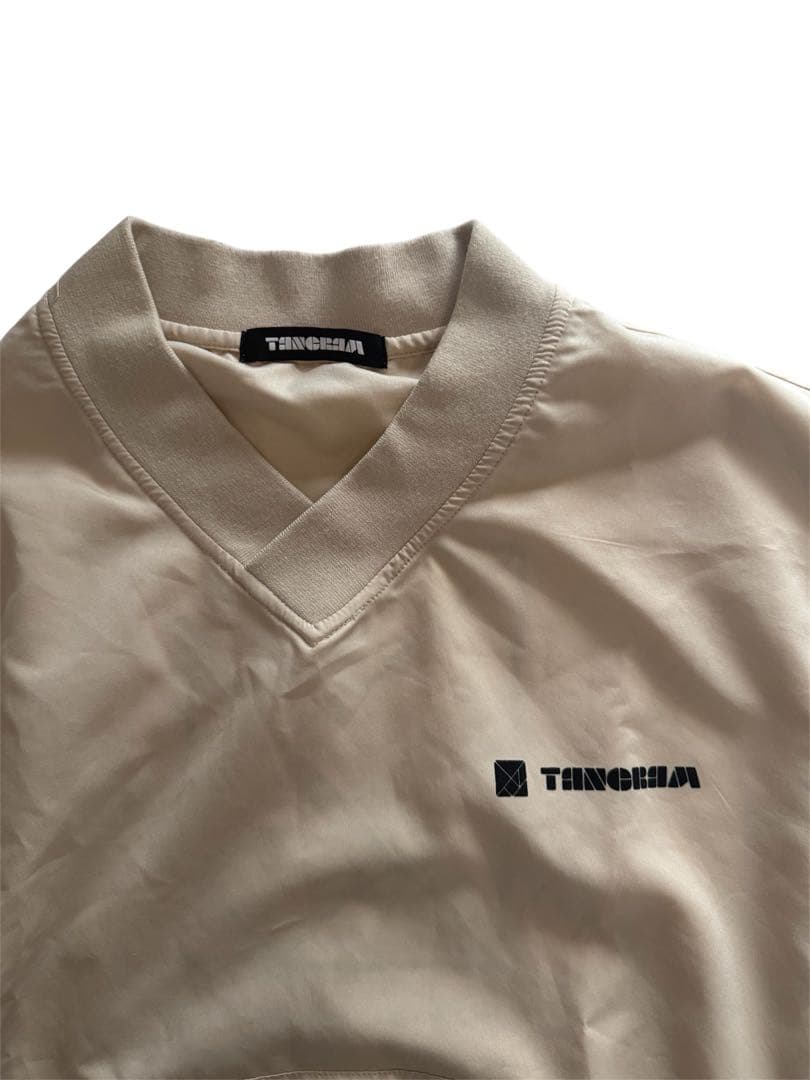 TANGRAM ベージュ Vネック TURF WIND SHIRTS