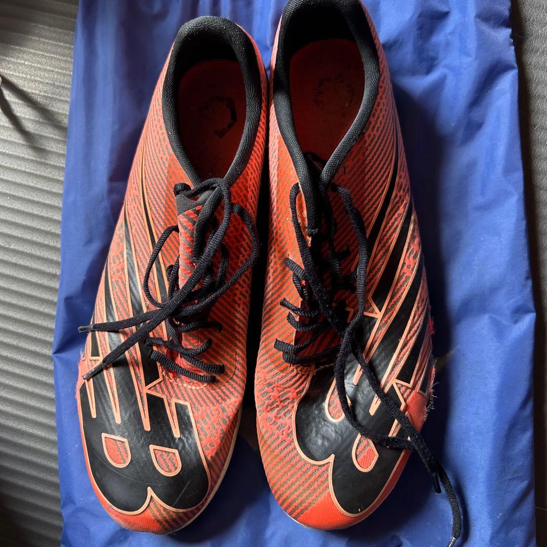 New Balance スパイクシューズ オレンジ