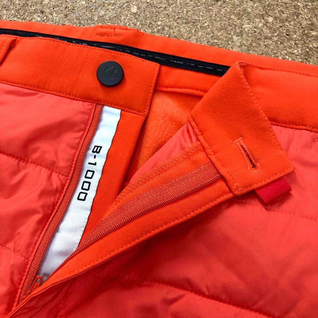 【美品】ブリヂストンTOURBゴルフウェア パンツ88cmメンズオレンジ中綿秋冬