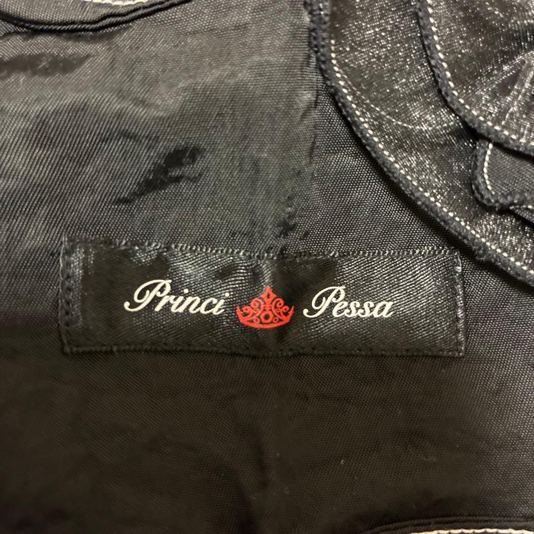 princi pessa 黒い花の装飾付きエプロン