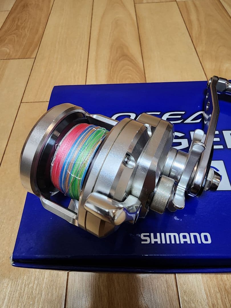 シマノ　11オシアジガー　1000HG 社外ハンドル