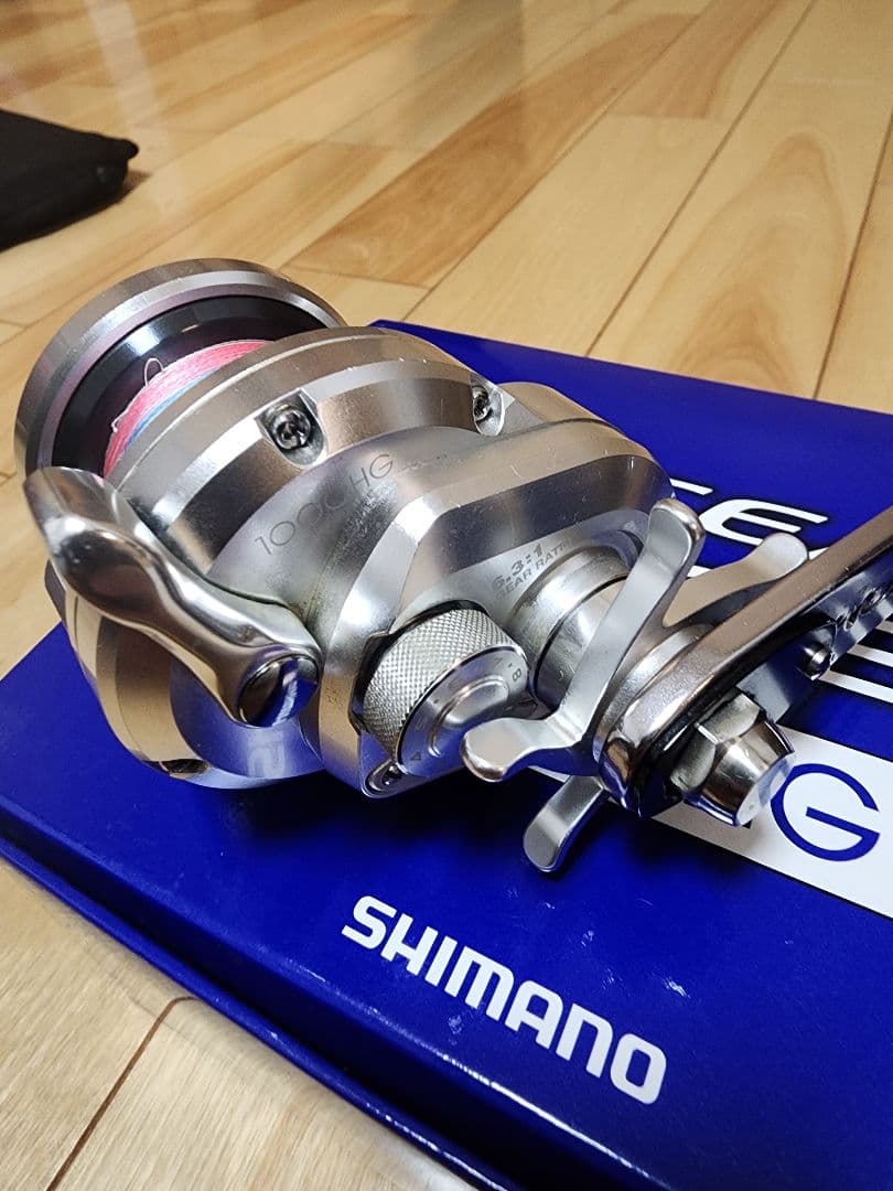 シマノ　11オシアジガー　1000HG 社外ハンドル
