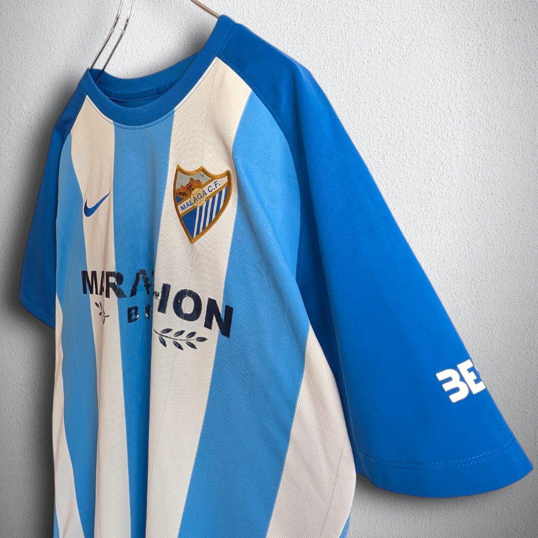 古着 サッカー ユニフォーム ゲームシャツ マラガ NIKE ナイキ メンズ L