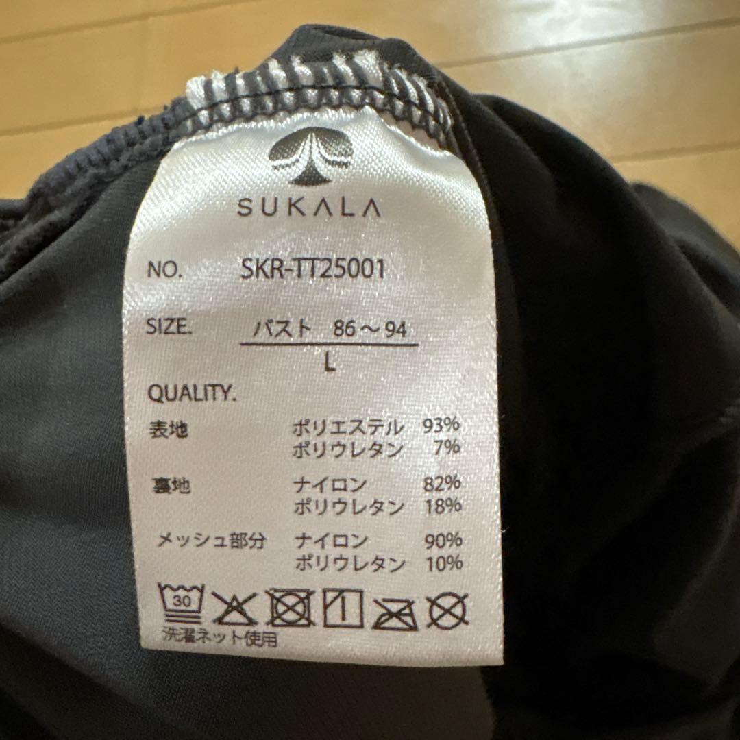 スカーラ　ウイングショルダートップス