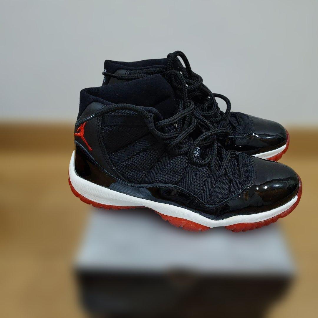 Air Jordan 11 ブラック/レッド