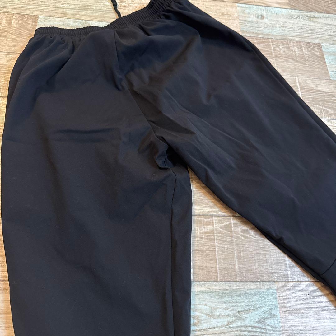 新品　YONEX M ストレッチ ブラックパンツ　ピンクロゴ