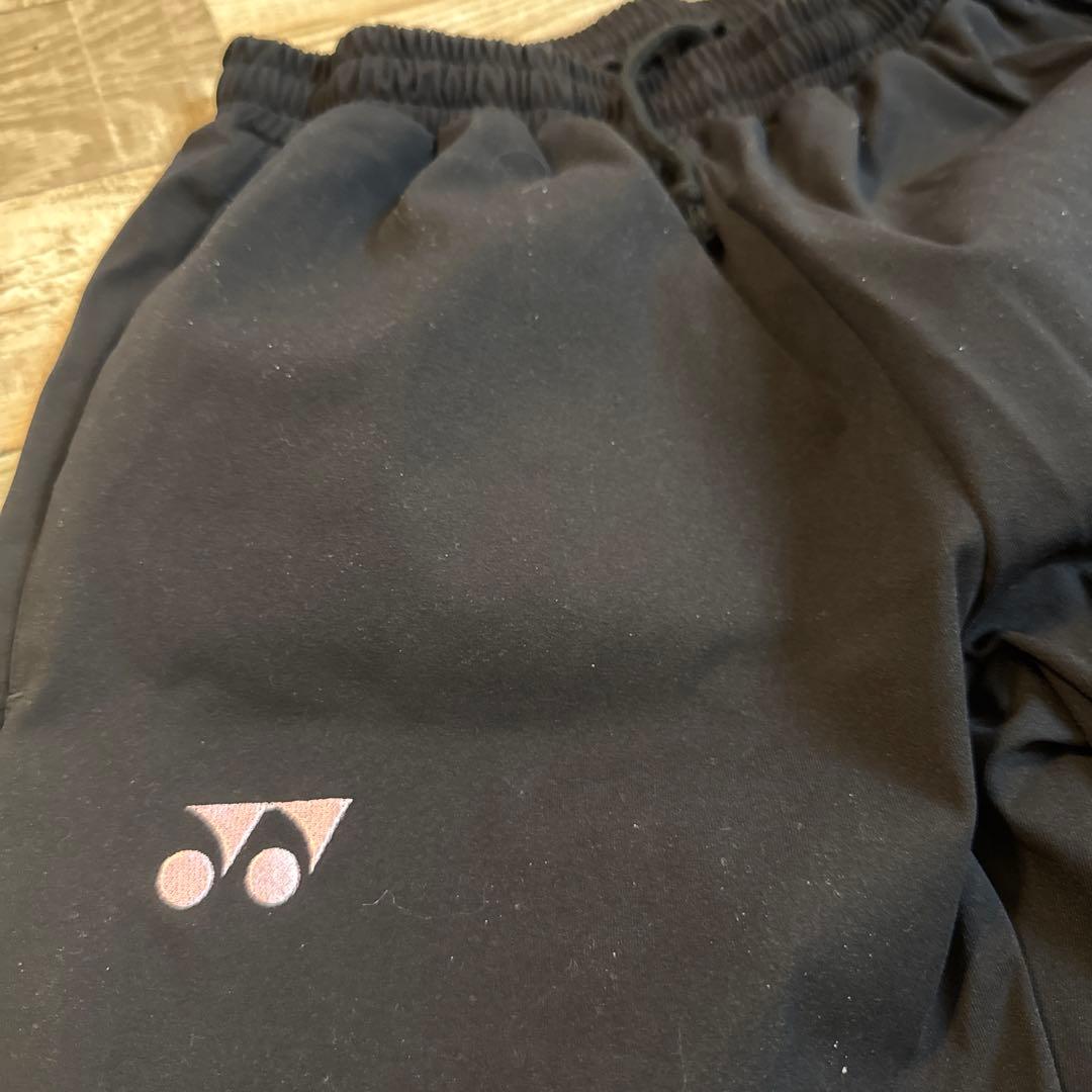 新品　YONEX M ストレッチ ブラックパンツ　ピンクロゴ