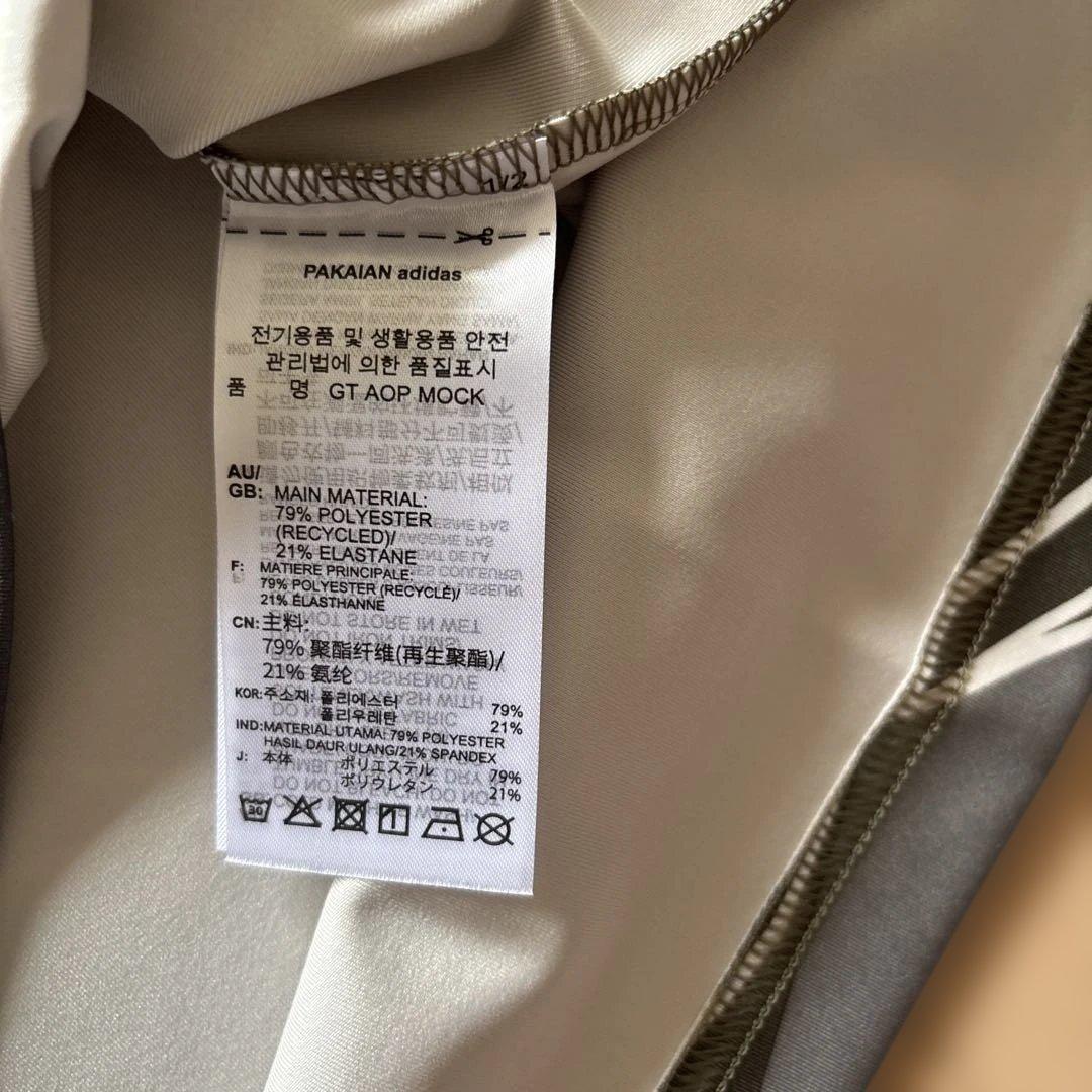 ☆新品☆adidas golfアディダスゴルフ半袖モックネック幾何学模様シャツM