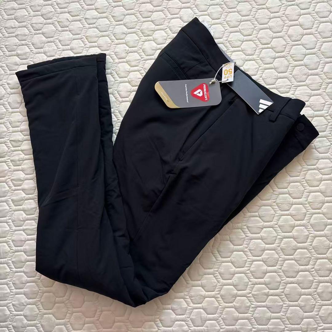 79新品27500円アディダスゴルフ/メンズ/秋冬/中綿ストレッチパンツ/黒