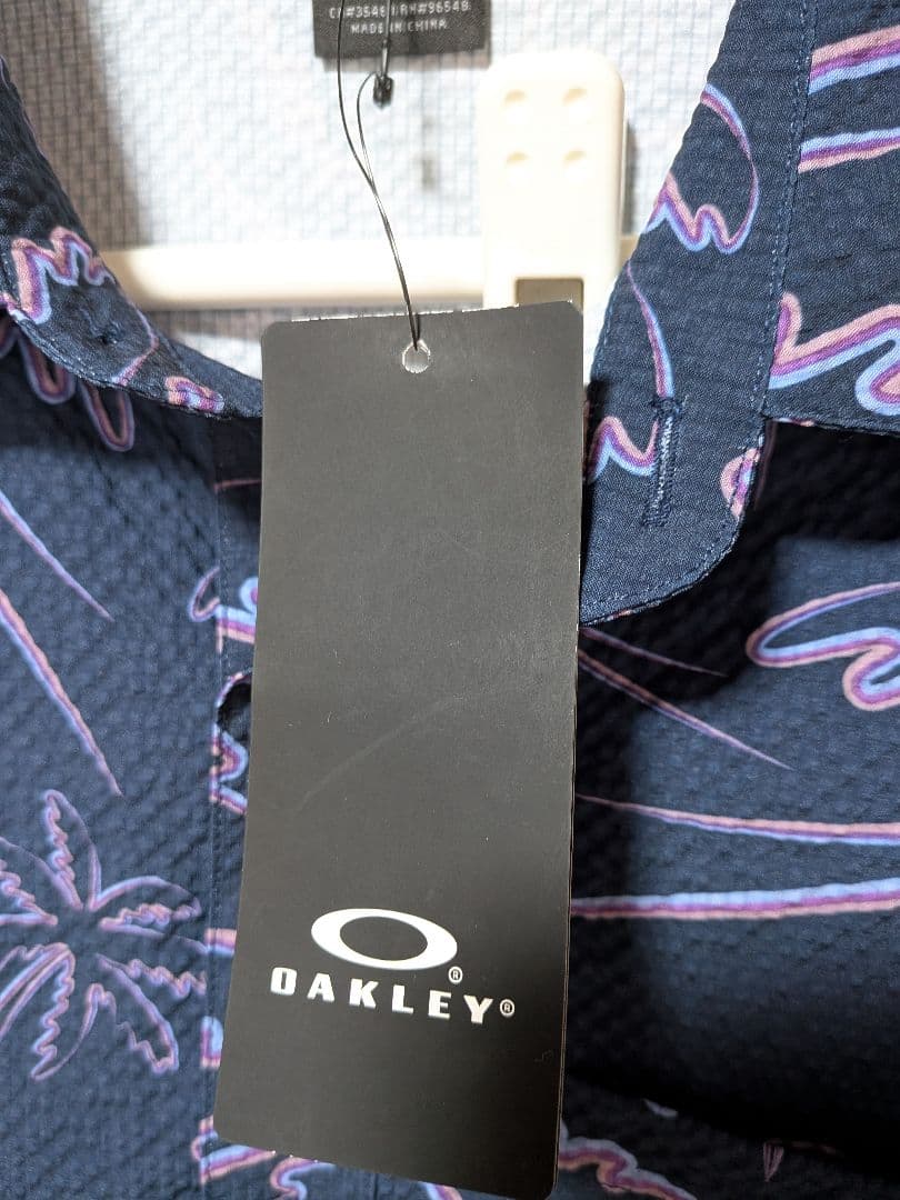 オークリー　半袖シャツ　プルオーバー　新品　総柄　S　jp　М　OAKLEY