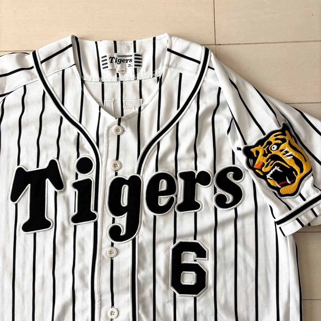 阪神タイガース　レプリカユニフォームＬ（未使用に近い）＆応援グッズ２品（未開封）