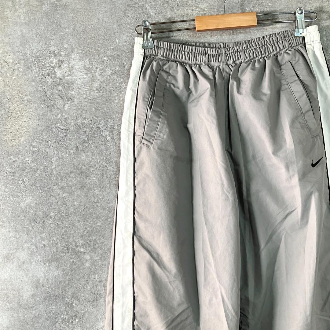 NIKE　トラックパンツ　ジャージ　グレー　ロゴ　ライン　メッシュ　フィットネス