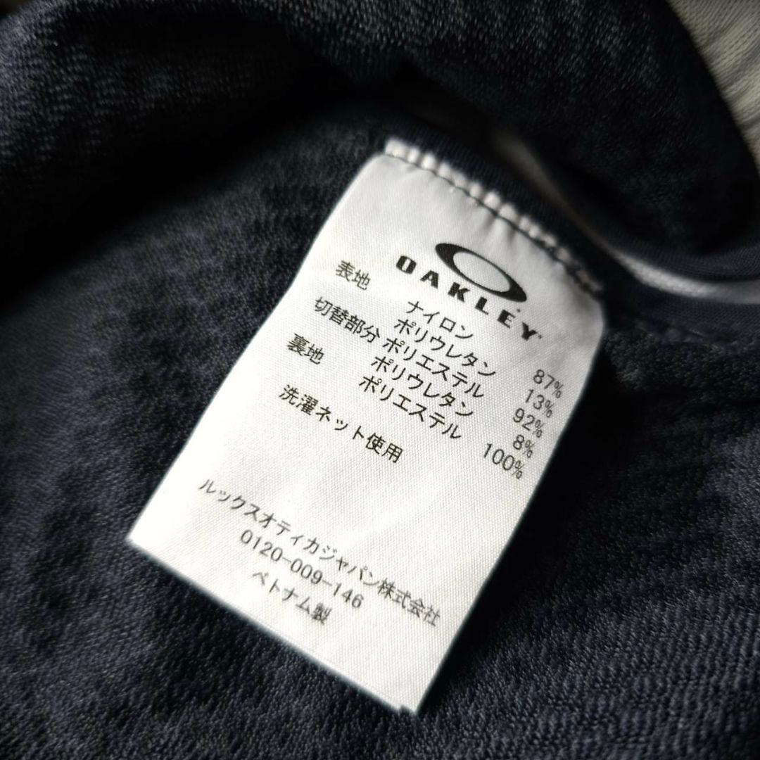 【オークリーゴルフ】蓄熱HEAT×防風 グラフィックデザイン 秋冬ゴルフバンツM