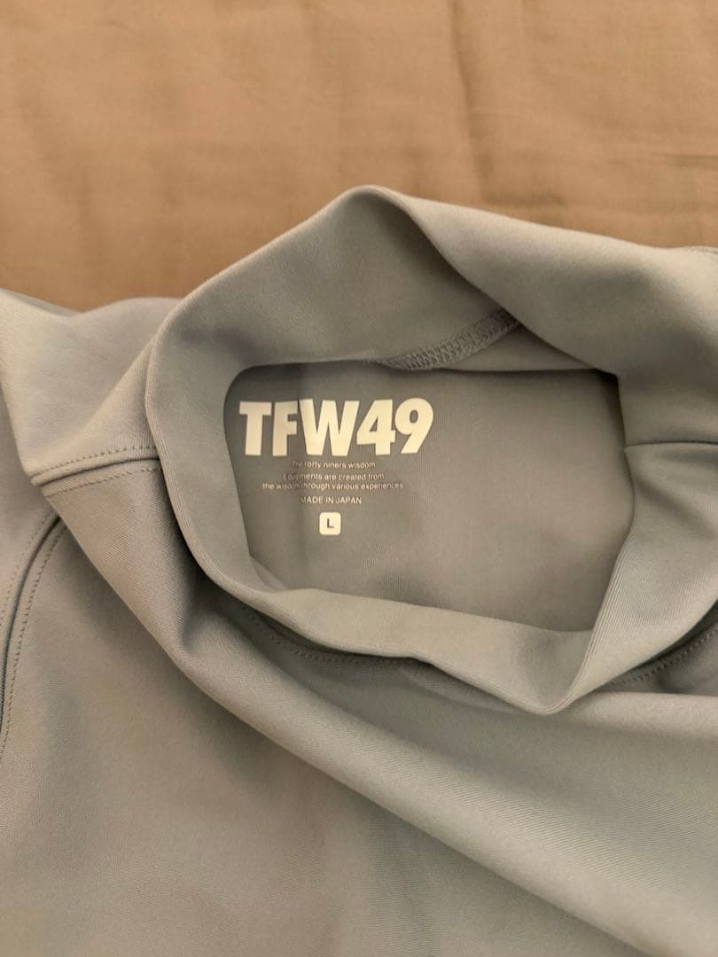 メンズウェア TFW49 LS MOCKNECK L.BLUE L