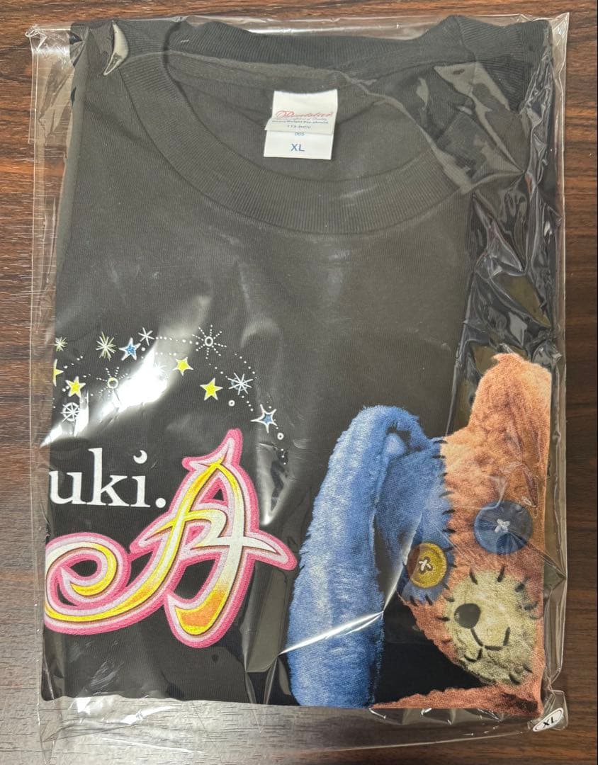 tuki. SAINT Mxxxxxx Collaboration Tシャツ