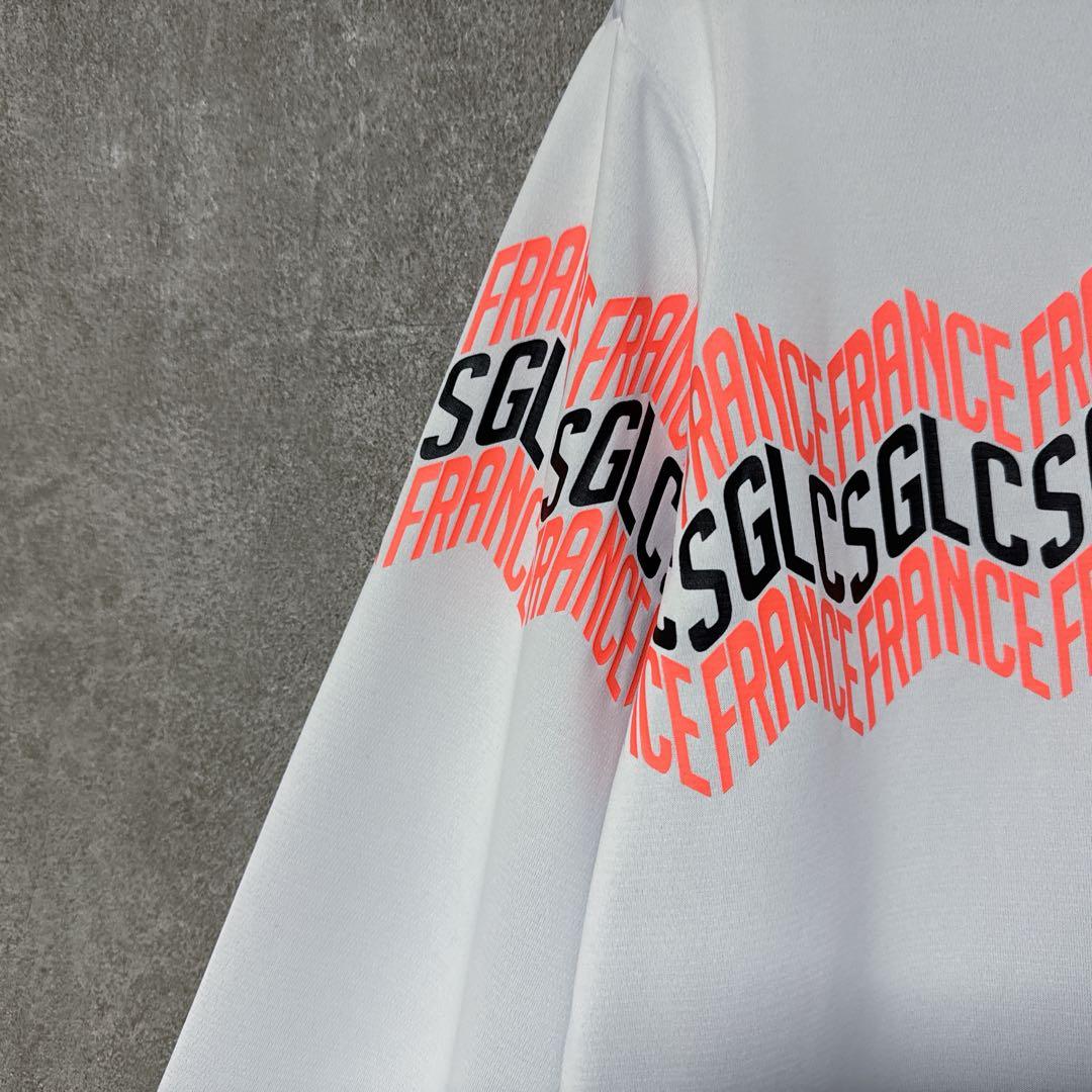 le coq sportif ルコック ロゴ総柄 長袖ポロシャツ ホワイト M