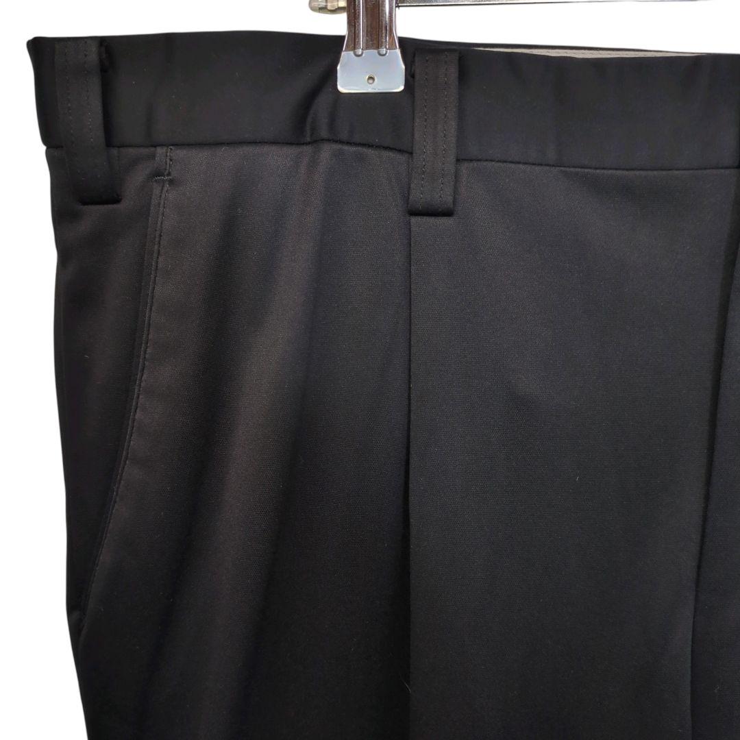 良品 マンシングウェア Munsingwear スラックス 100 黒 蓄熱