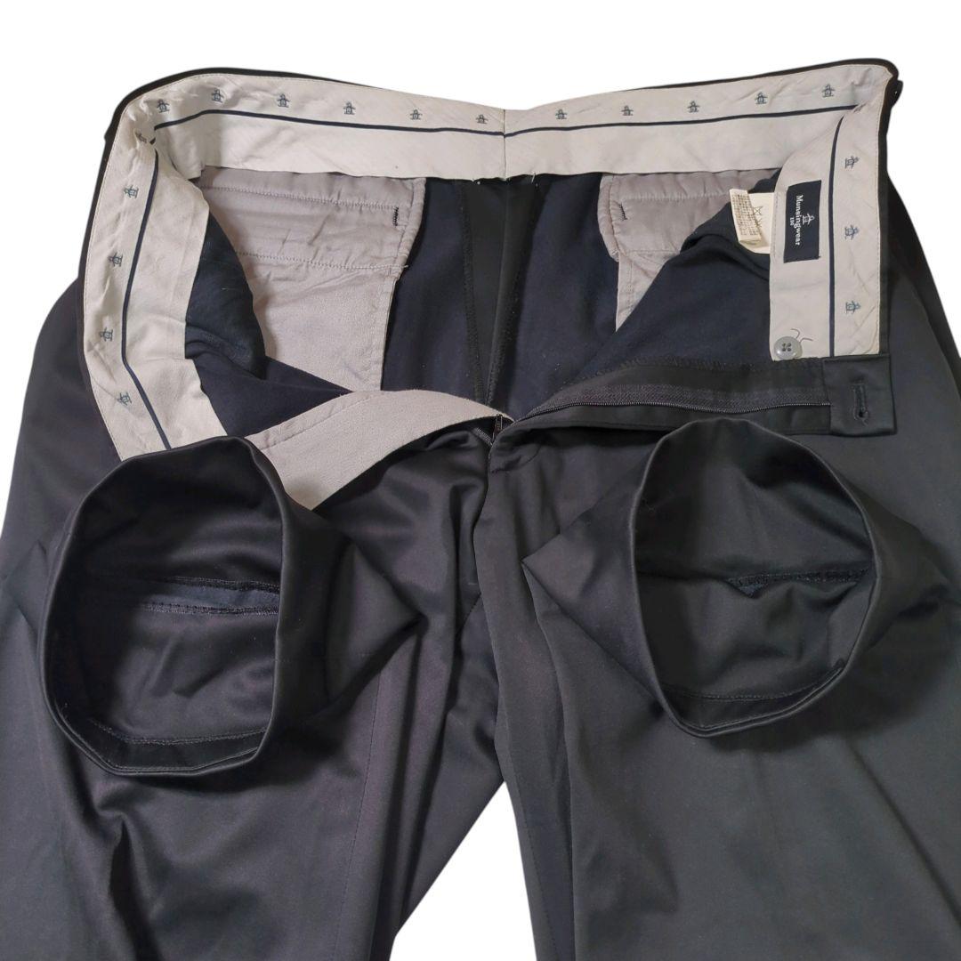 良品 マンシングウェア Munsingwear スラックス 100 黒 蓄熱