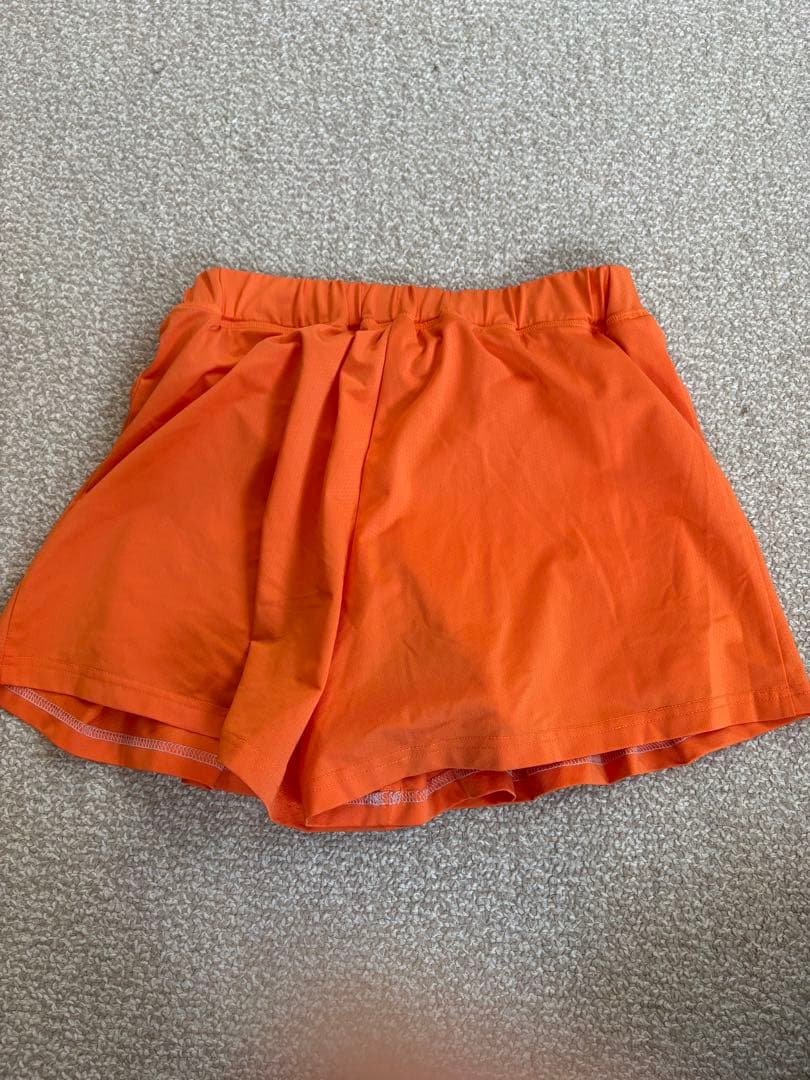 YONEX VERSICOOL オレンジスカート JP L