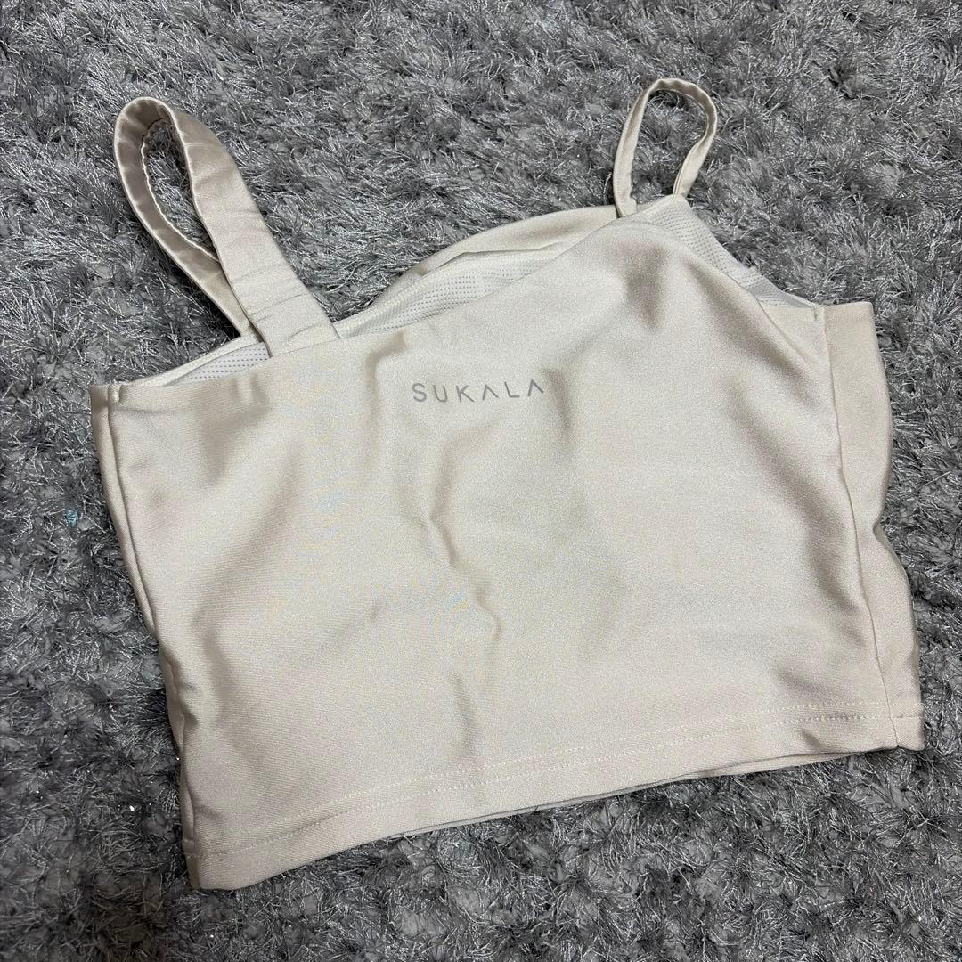SUKALA シャインストレッチアシンメトリーブラトップ