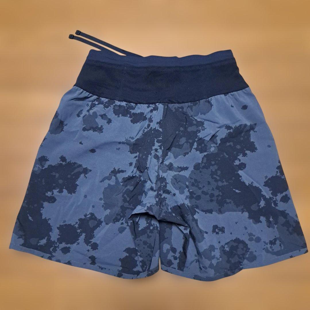 【美品】ノースフェイス ノベルティーフライウェイトレーシングショーツ メンズL