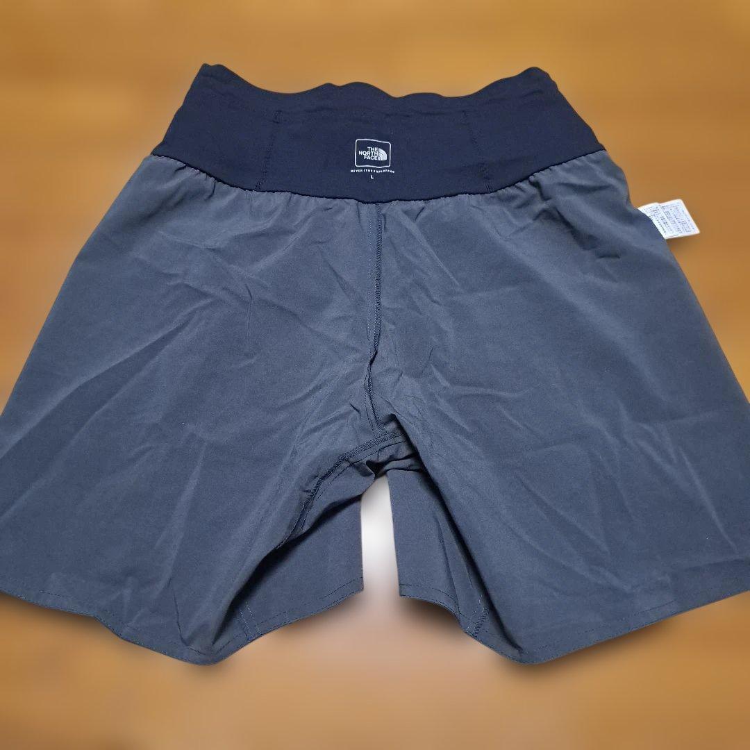 【美品】ノースフェイス ノベルティーフライウェイトレーシングショーツ メンズL
