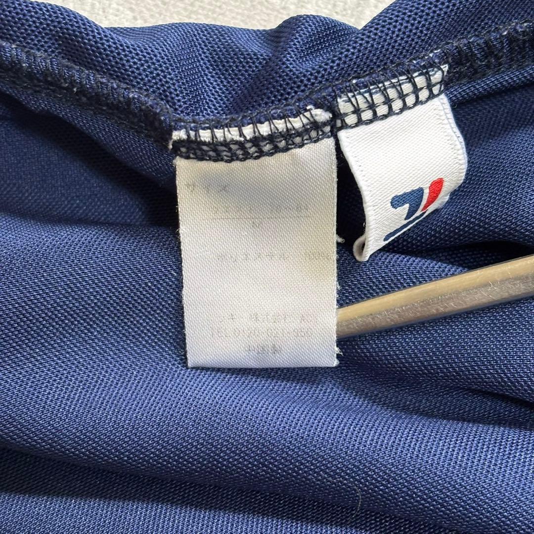 FILA ジャージ下　メンズM（ユニセックス可）　明るいネイビー　ブランドロゴ