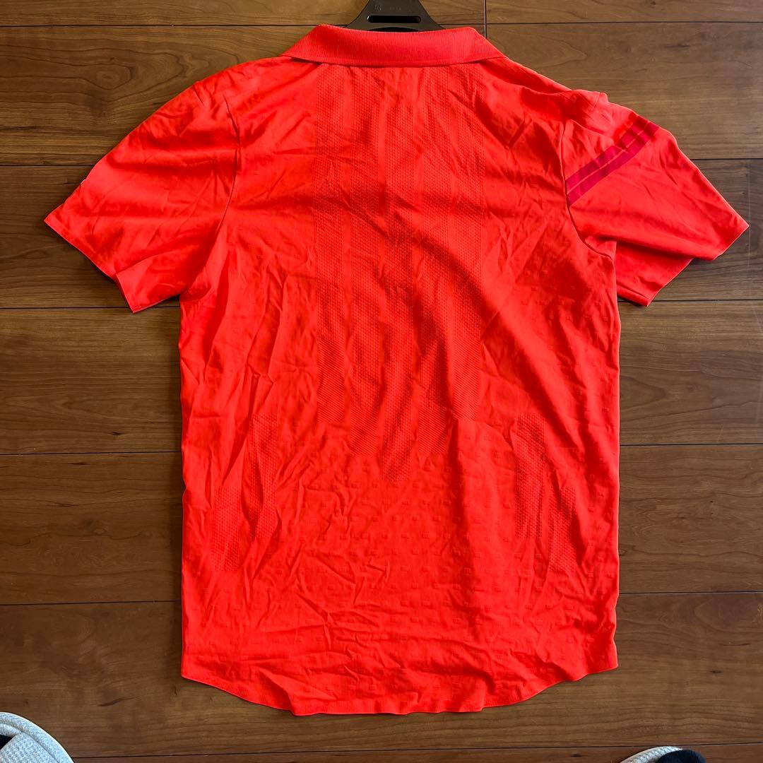 Nike フェデラー　オレンジポロシャツ