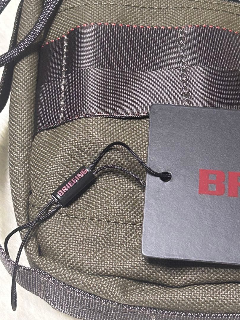 新品 BRIEFING ラウンドポーチ クラッチバッグ レンジャーグリーン