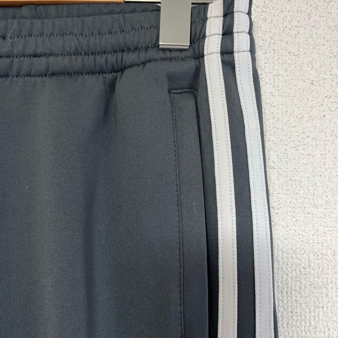 adidas Adilenium フレア トラックパンツ サイズS（グレー）