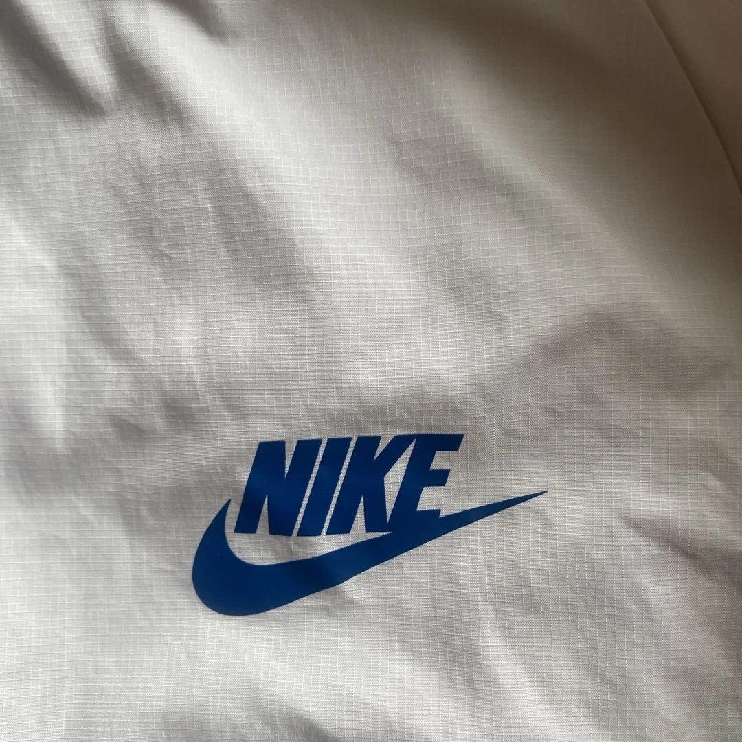 Nike ウィンドブレーカーレディース 赤/青/黄色