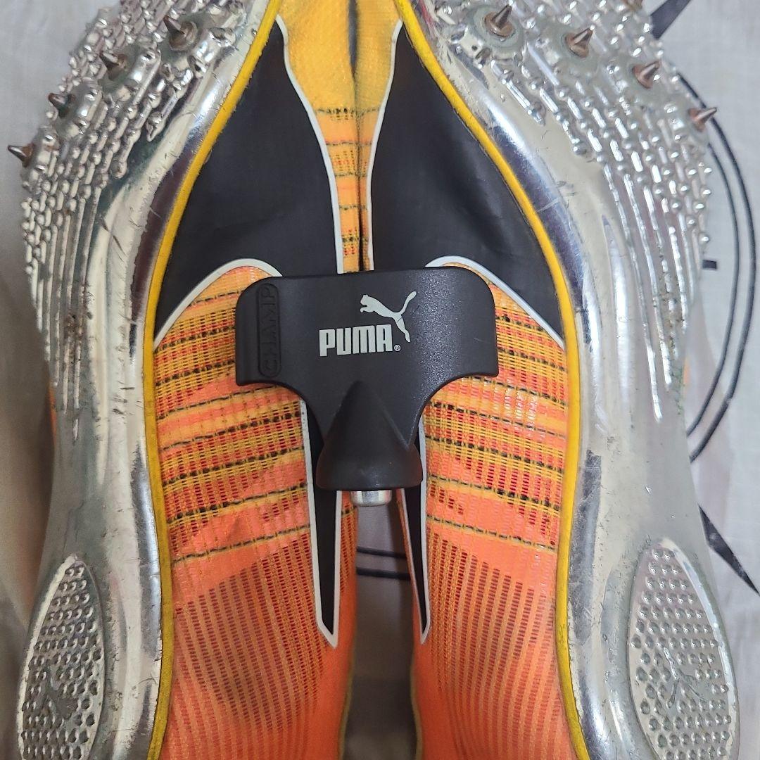 PUMA スパイクシューズ オレンジ/黒